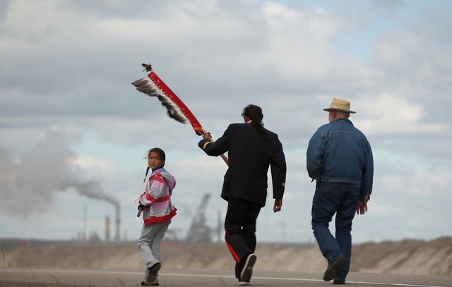 three people walking